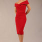 brunette model wearing diva catwalk pencil skirt dress sleeveless with lowered neckline and pleating on side in scarlet red colour front image