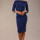 model wearing diva catwalk york pencil-skirt dress with sleeves and rounded folded collar and plearing across the tummy area in navy blue colour front