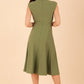 model wearing diva catwalk rochelle swing skirt a line dress without sleeves with a low v neck in vineyard green back