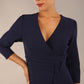 model wearing a divacatwalk Seed Bracklesham Pencil Classic Dress with 3/4 sleeve with knee length in navy blue colour