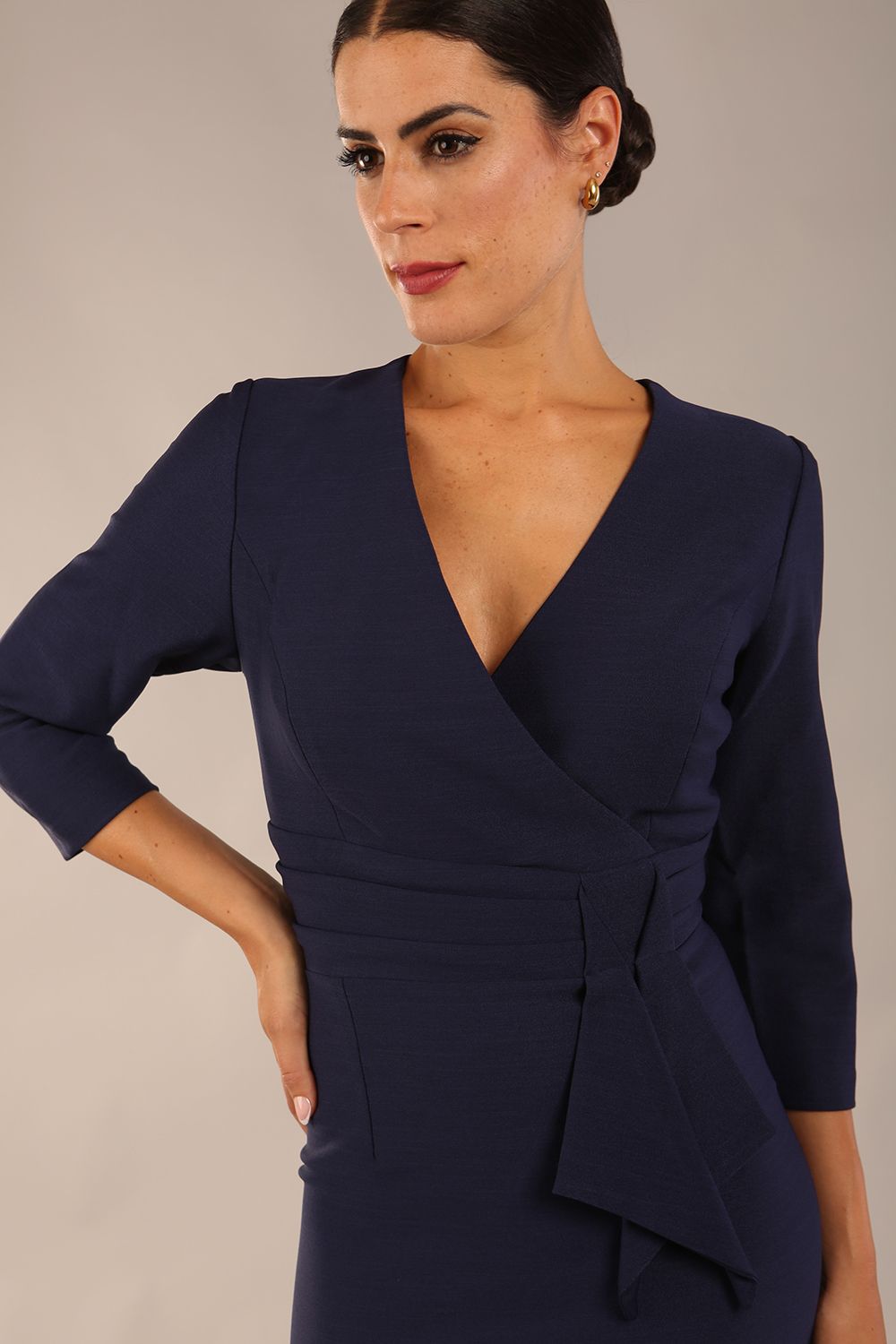 model wearing a divacatwalk Seed Bracklesham Pencil Classic Dress with 3/4 sleeve with knee length in navy blue colour