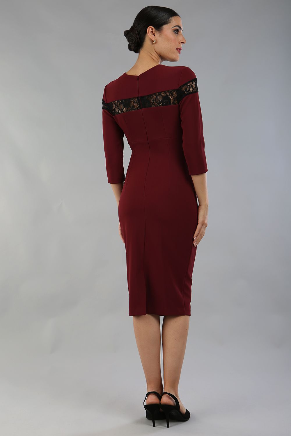 Model wearing the Diva Atlantis Pencil dress with three quarter length sleeves in cabaret burgundy and black back image