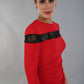 Model wearing the Diva Atlantis Pencil dress with three quarter length sleeves in true red and black side close up image