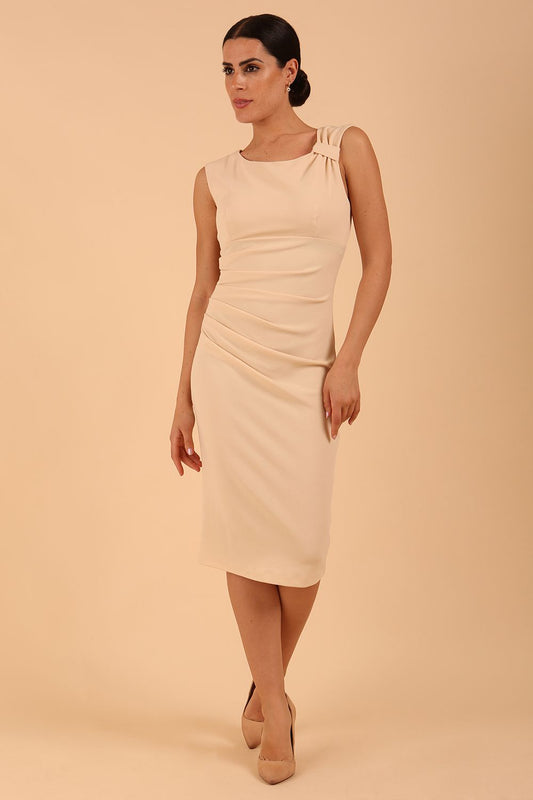 model is wearing Sleeveless marvel stretch Diva Roseberry pencil dress in beige front
