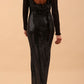 Brunette Model wearing a long full length metallic sparkle dress by Diva Catwalk back