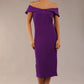 brunette model wearing diva catwalk juilet midaxi pencil sleeveless off shoulder dress with open neck and folded collar in colour passion purple front