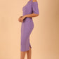 model is wearing diva catwalk solway pencil dress cold shoulder detail and rounded neckline in Violet Tulip front side