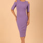 model is wearing diva catwalk solway pencil dress cold shoulder detail and rounded neckline in Violet Tulip front