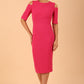 model is wearing diva catwalk solway pencil dress cold shoulder detail and rounded neckline in Fuchsia Pink front