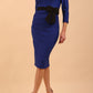 model wearing diva catwalk luma pencil skirt dress with contrasting bow off shoulder with sleeves in cobalt blue front