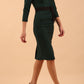 model wearing diva catwalk luma pencil skirt dress with contrasting bow off shoulder with sleeves in forest green front side