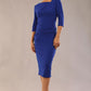 model wearing a diva catwalk Rococo 3/4 Sleeved Pencil Dress with asymmetric neckline with pleating details and 3/4 sleeves length and knee length in cobalt blue colour