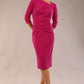 model wearing a diva catwalk Rococo 3/4 Sleeved Pencil Dress with asymmetric neckline with pleating details and 3/4 sleeve length and knee length in magenta colour