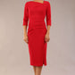 model is wearing a diva catwalk Amity Asymmetric Neckline Pleated front and back with 3/4 sleeves and front vent pencil Dress in True Red colour