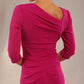 model wearing a diva catwalk Rococo 3/4 Sleeved Pencil Dress with asymmetric neckline with pleating details and 3/4 sleeves length and knee length in magenta colour