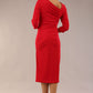 model is wearing a diva catwalk Amity Asymmetric Neckline Pleated front and back with 3/4 sleeves and front vent pencil Dress in True Red colour back