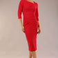 model is wearing a diva catwalk Amity Asymmetric Neckline Pleated front and back with 3/4 sleeves and front vent pencil Dress in True Red colour