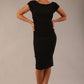 model is wearing diva catwalk polly cap sleeve pencil dress with rounded neckline at the front and deep lowered rounded cutout at the back in black front