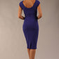 Model wearing Diva Catwalk Polly Rounded Neckline Pencil Cap Sleeve Dress with pleating across the tummy area in Deep Orient Blue back