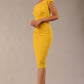 Model wearing Diva Catwalk Polly Rounded Neckline Pencil Cap Sleeve Dress with pleating across the tummy area in Mustard Yellow front side