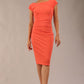 Model wearing Diva Catwalk Polly Rounded Neckline Pencil Cap Sleeve Dress with pleating across the tummy area in sea coral front