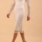 Model wearing a diva catwalk Montana Lace Dress with long lace sleeve and knee length with round lace neckline  in Ivory Cream colour front side