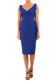 Model wearing diva catwalk Malvern Sleeveless  Pencil Wiggle Dress with tie detail at waist and shoulders in Cobalt Blue colour side front