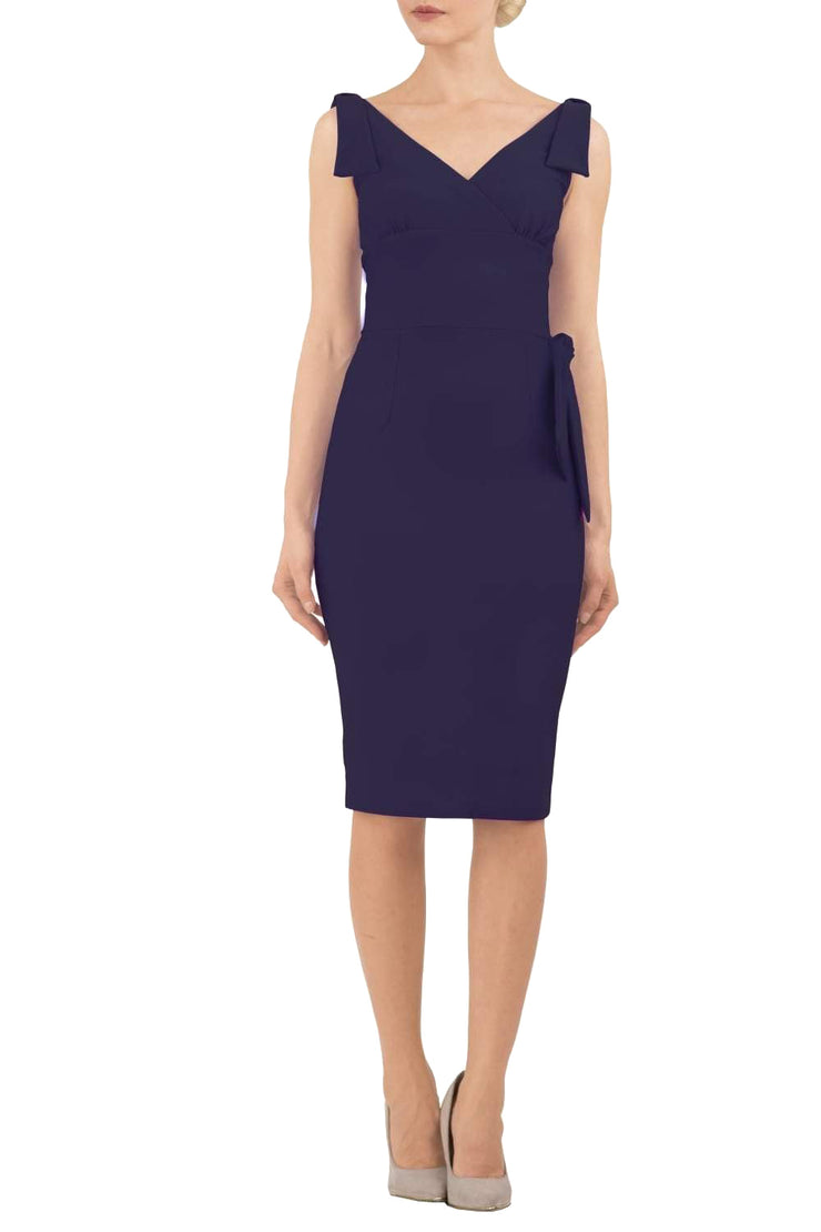 Model wearing diva catwalk Malvern Sleeveless  Pencil Wiggle Dress with tie detail at waist and shoulders in Navy Blue colour side front