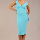 Model wearing diva catwalk Malvern Sleeveless Pencil Wiggle Dress with tie detail at waist and shoulders in Sky Blue colour side front