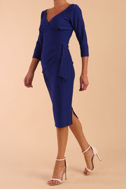 Model wearing Regatta Diva Catwalk Low V-Neckline 3/4 sleeve Pencil Dress in Cobalt Blue side