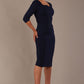 model is wearing a diva catwalk hathaway sweetheart neckline pencil dress in navy blue against a plain background front view