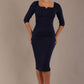 model is wearing a diva catwalk hathaway sweetheart neckline pencil dress in navy blue against a plain background front view