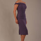 Model wearing the Diva Cloud Luxury Ripple Crepe cloud off-shoulder dress  design in dark mauve front image against a plain background