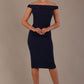 Model wearing the Diva Cloud Luxury Ripple Crepe cloud off-shoulder dress  design in navy blue front image against a plain background