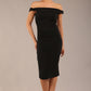 brunette model wearing a diva catwalk cloud pencil fitted flattering dress off shoulder sleeveless with detail with pleating around the front in black front