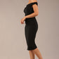 brunette model wearing a diva catwalk cloud pencil fitted flattering dress off shoulder sleeveless with detail with pleating around the front in black front