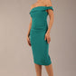 brunette model wearing a diva catwalk cloud pencil fitted flattering dress off shoulder sleeveless with detail with pleating around the front in parasailing green front