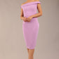 brunette model wearing a diva catwalk cloud pencil fitted flattering dress off shoulder sleeveless with detail with pleating around the front in sheer lilac front