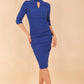 model is wearing diva catwalk pinhoe pencil dress with sleeved and high neckline with a keyhole detail in the middle and pleating across the tummy area in cobalt blue front