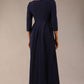 Brunette Model is wearing 3/4 sleeve sweetheart neckline swing navy blue dress