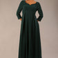 Brunette Model is wearing 3/4 sleeve sweetheart neckline swing forest green dress