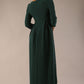 Brunette Model is wearing 3/4 sleeve sweetheart neckline swing forest green dress