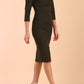 model is wearing diva catwalk polly sleeved pencil dress with low rounded neckline at the back in Buckingham Green side