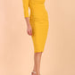 model is wearing diva catwalk polly sleeved pencil dress with low rounded neckline at the back in Mustard Yellow side