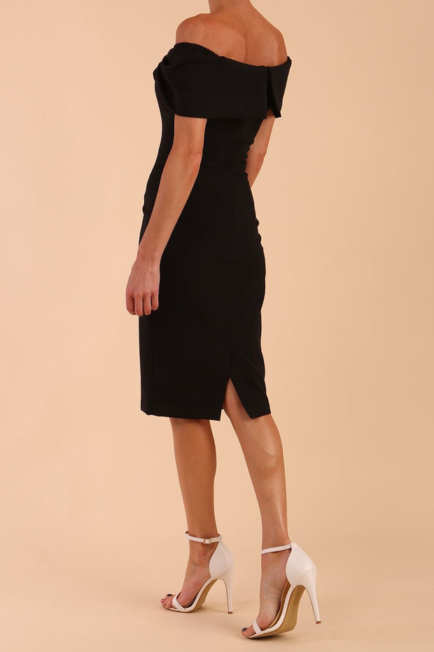 model is wearing diva catwalk mariposa pencil dress with Detailed Bardot neckline with fold-over detail and pleated at waist area in Black back side
