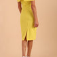 model is wearing diva catwalk mariposa pencil dress with Detailed Bardot neckline with fold-over detail and pleated at waist area in Blazing Yellow back