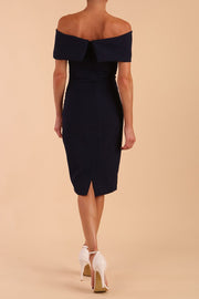 model is wearing diva catwalk mariposa pencil dress with Detailed Bardot neckline with fold-over detail and pleated at waist area in Navy Blue back