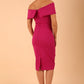 model is wearing diva catwalk mariposa pencil dress with Detailed Bardot neckline with fold-over detail and pleated at waist area in magenta haze back