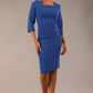 model is wearing diva catwalk quatro sleeved pencil dress with asymmetric wide cut our neckline in cobalt blue front