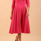 Model wearing Diva Catwalk Chesterton Sleeved dress with oversized collar detail and a-line swing pleated skirt in colour fuchsia pink front